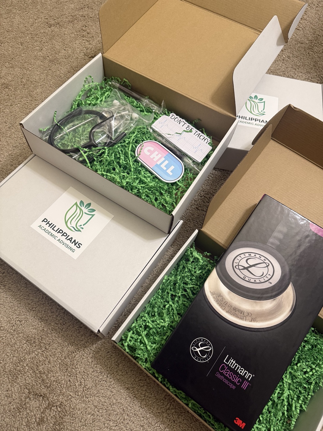 Philippians giveaway boxes packed with a Littmann Classic III stethoscope, a second stethoscope and medical stickers